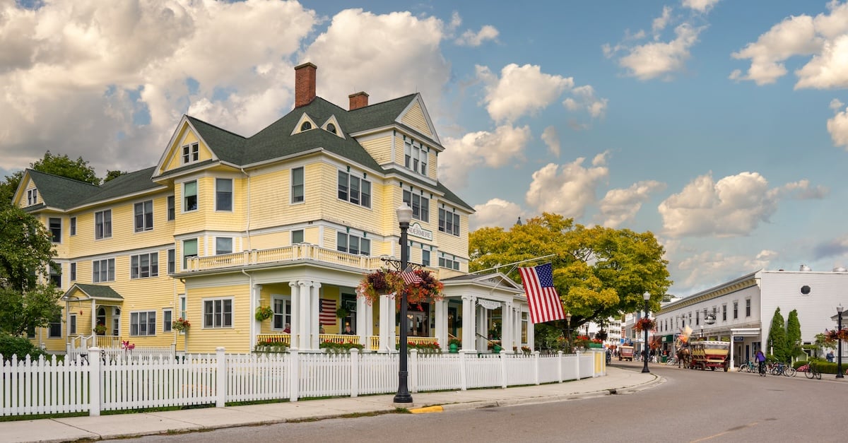 yellow house with dark roof